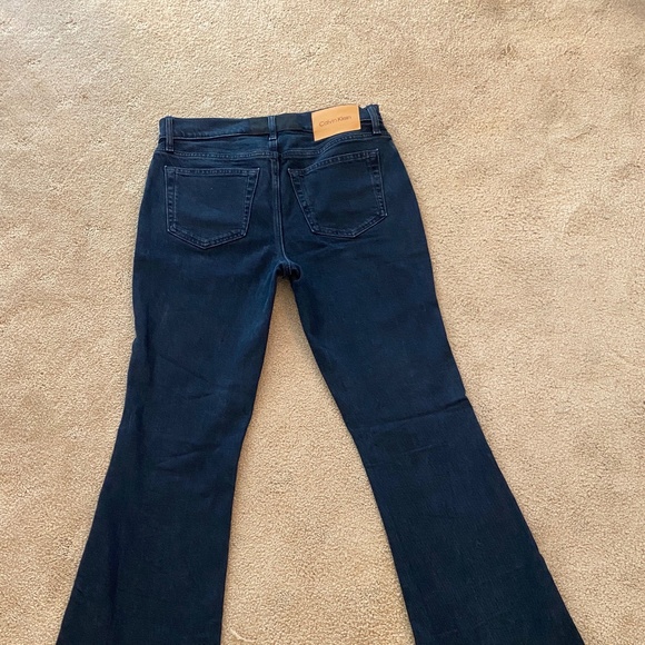 Calvin Klein Mid-Rise Flare Jeans - Picture 3 of 6